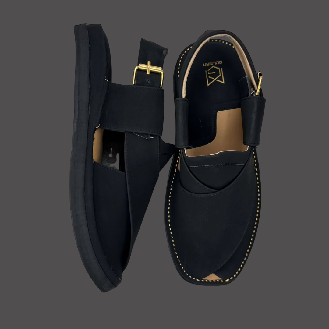 Matte black leather Peshawari sandals.